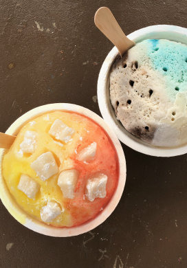Two cups of colorful shave ice