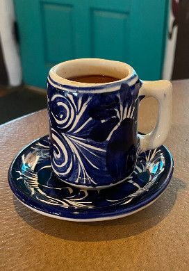 Blue ceramic mug of chocolate elixir