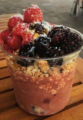 Acai bowl topped with granola, fresh berries, shredded coconut, and a drizzle of honey, Whatever Pops, Tampa