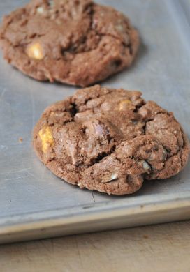 Chocolate Cadbury Mini Egg cookies on a baking sheet