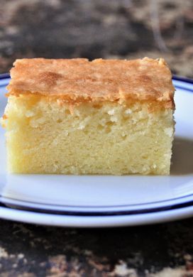 Square slice of Hawaiian butter mochi on a plate