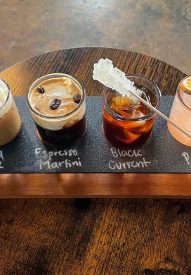 Flight of four miniature iced coffee drinks