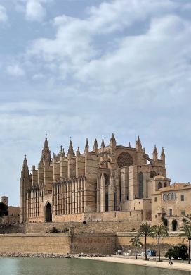 Ornate cathedral overlooking a canal