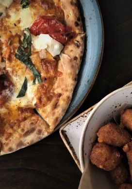 Pizza and cheese curds on a table, Cedar + Stone Urban Table, Mall of America