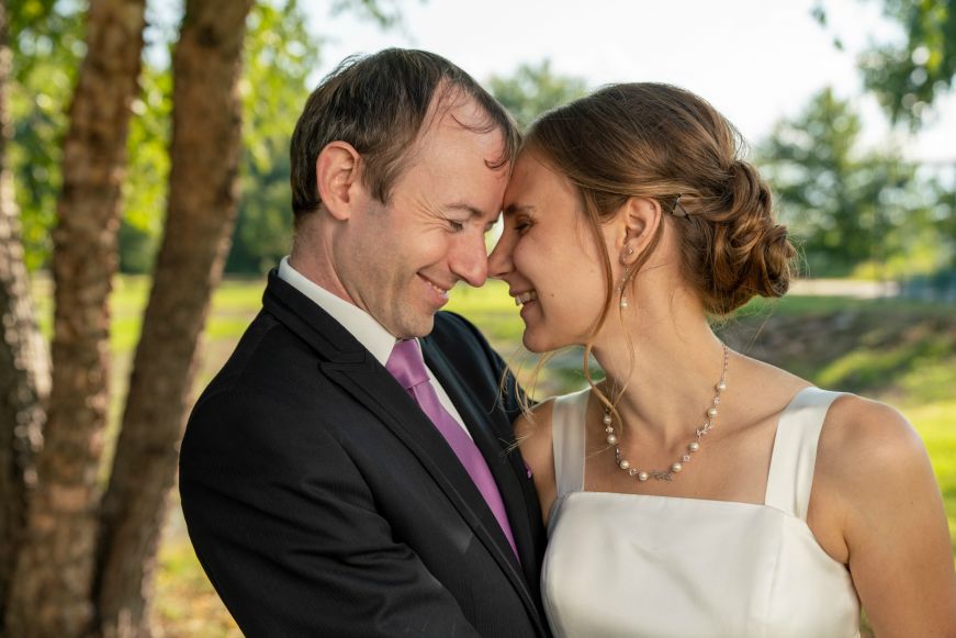 Stacy and MIke nuzzling each other lovingly