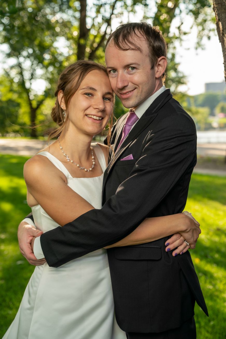 Stacy and Mike with their arms wrapped around each other