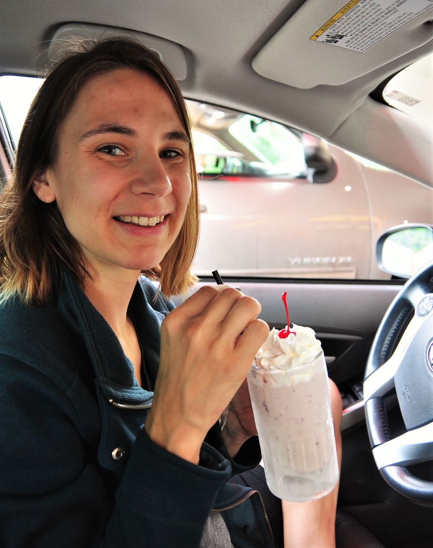 Stacy with a raspberry malt at the Taylor's Falls Drive In