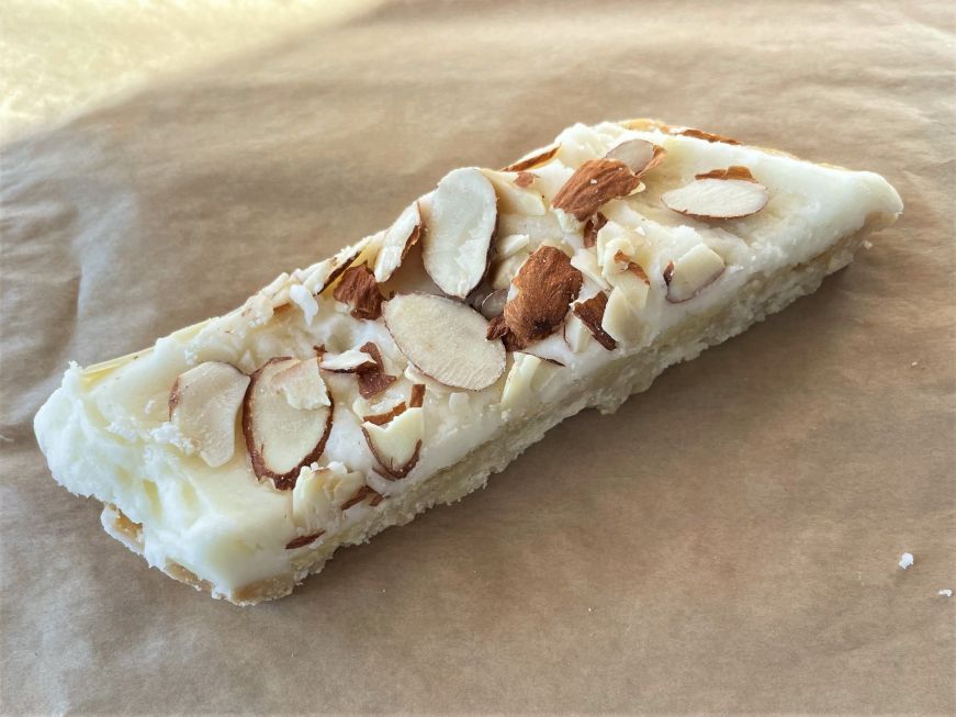 Almond kringler, Finnish Bistro Rectangular shortbread cookie topped with a thick layer of frosting and sliced almonds