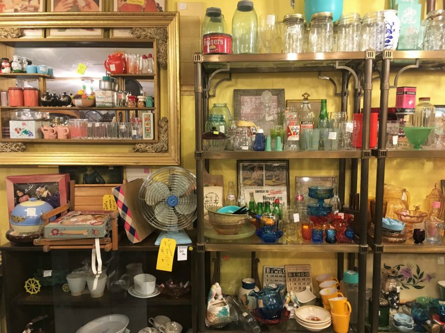 Shelves of antique kitchenware at Egg Krate, Elk Horn, Iowa