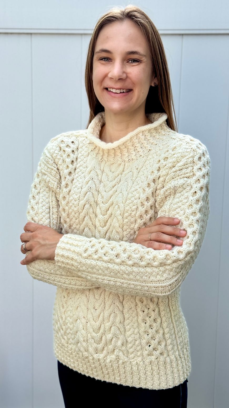 Stacy wearing an Aran sweater