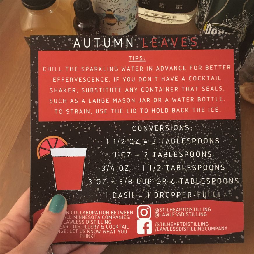 Autumn Leaves cocktail kit instruction card Hand holding Autumn Leaves cocktail kit instruction card