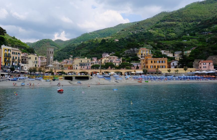 Beach with colorful village in the background