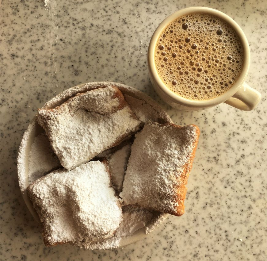 Beignets and cafe au lait, Cafe du Monde, New Orleans