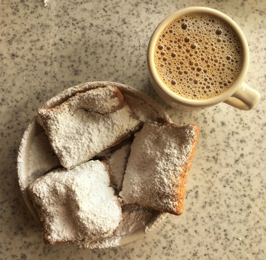 Beignets and cafe au lait at Cafe du Monde