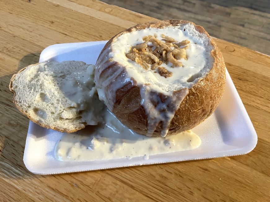 Clam chowder in a bread bowl at Boston Chowda Co. Bread bowl filled with clam chowder