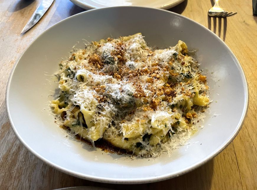 Pasta topped with grated cheese
