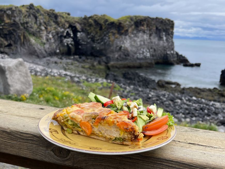Chicken quiche with sea cliffs in the background