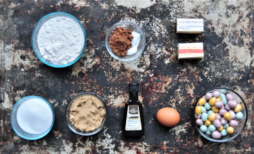 Top down view of ingredients arranged on a baking sheet