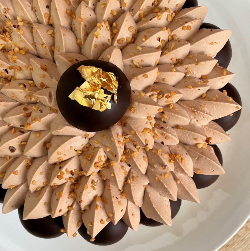Chocolate Saint Honore, Marc Heu Patisserie Pastry with elaborate pattern of chocolate whipped cream pipped on top