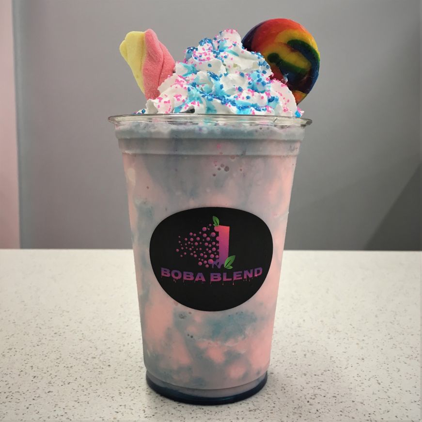 Pink and blue drink topped with whipped cream, colored sugar, and candy, Boba Blend, Kansas City, Kansas Pink and blue drink topped with whipped cream, colored sugar, and candy, Boba Blend, Kansas City, Kansas