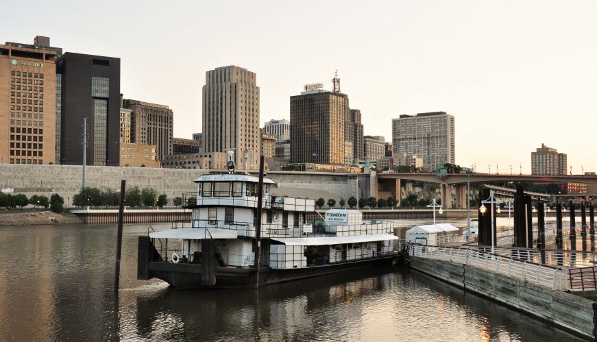 Boat with St. Paul skyline in the background, Covington Inn, St. Paul