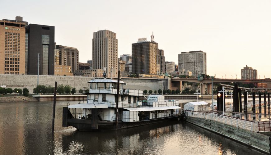 Houseboat on the Mississippi River with the St. Paul skyline in the background