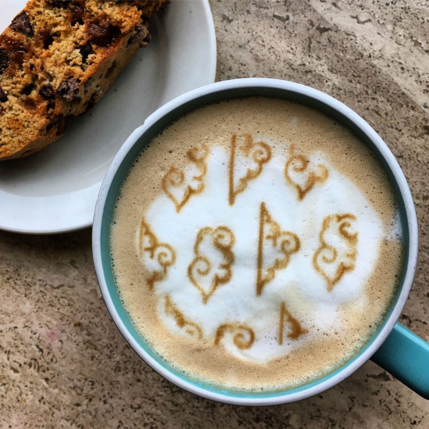 Daily Dose Coffee drink and biscotti Daily Dose Coffee drink and biscotti