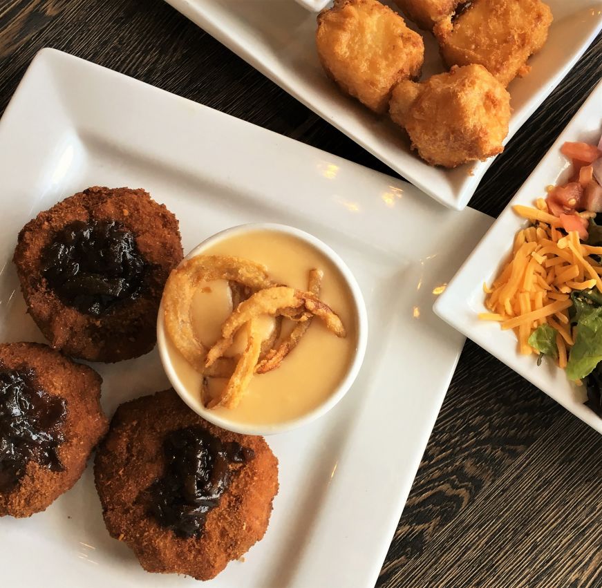 Vegan garden fresh croquettes, beer cheese bisque, and cheese curds, David Reay's