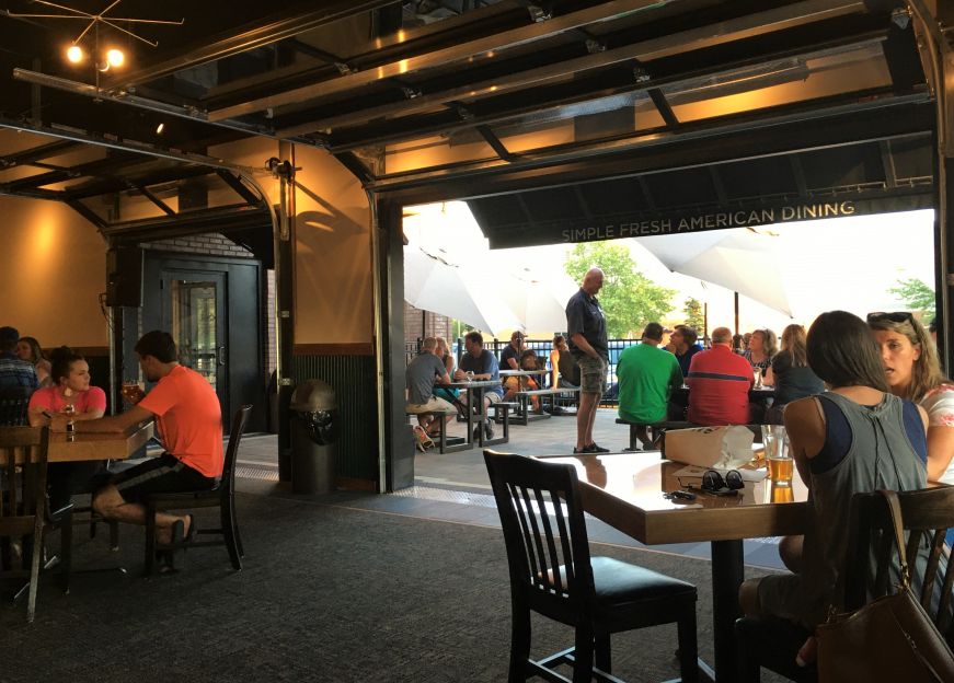 View of patio and indoor seating at Elm Creek Brewing Co.