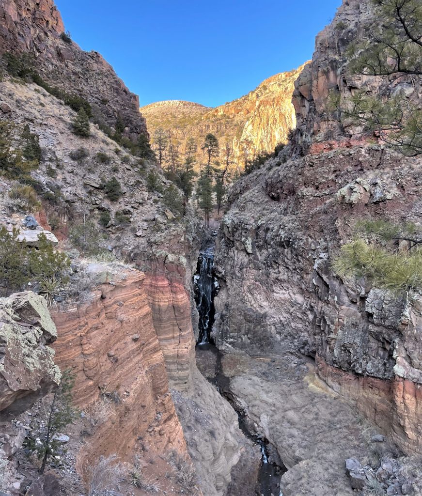 Waterfall in a canyon with steep sides