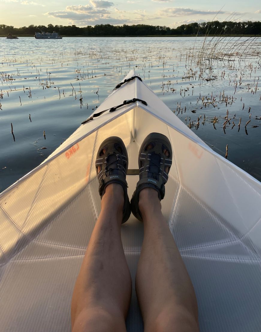 Stacy's feet in the front of kayak