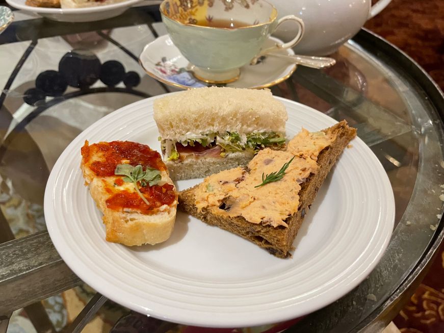 Finger sandwiches at Saint Paul Hotel afternoon tea China plate with three finger sandwiches