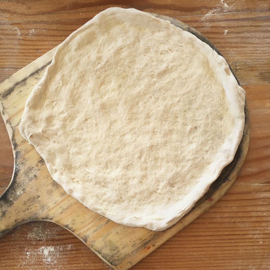 Flattened dough on table at 1889 Pizza Napoletana, Kansas City, Kansas