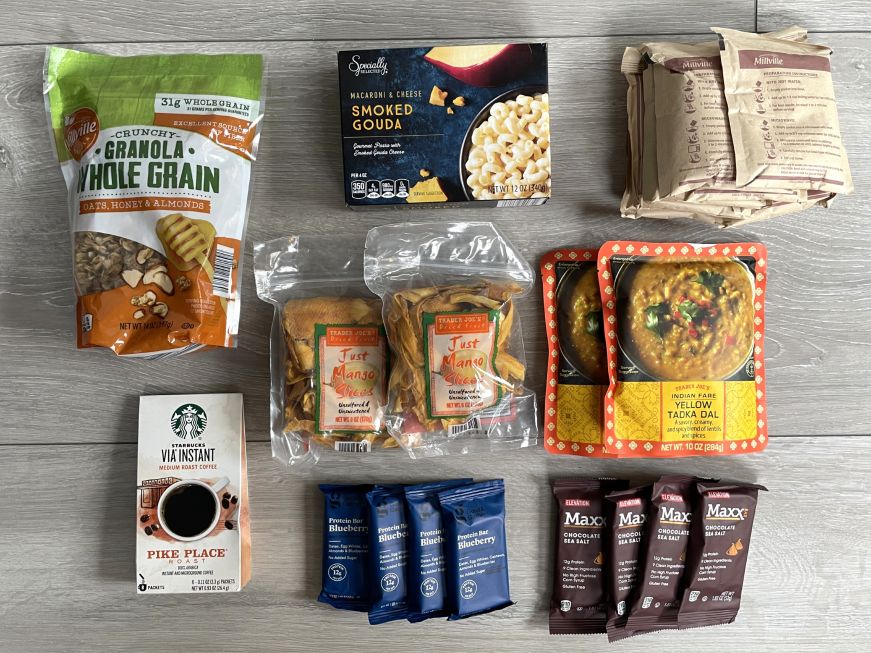 Packets of oatmeal, lentil dal, oatmeal, protein bars, and instant coffee