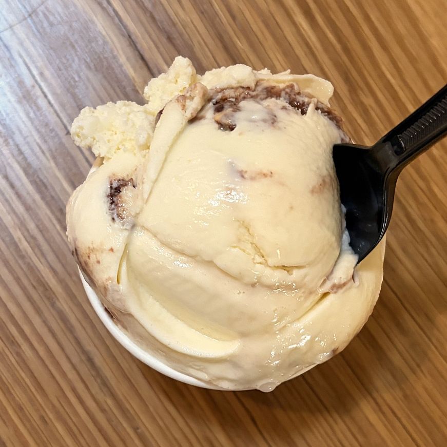 Scoop of ice cream in a paper cup