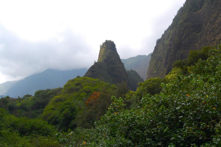 Rock spire in a lush green valley