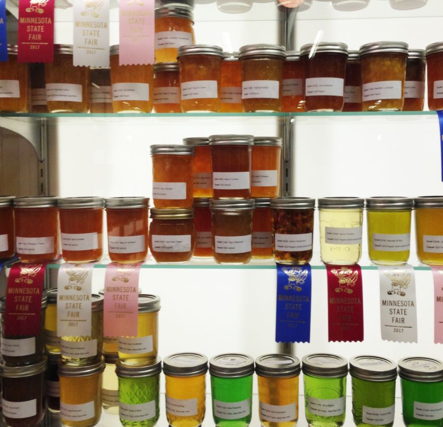 Canned jellies and jams the the Minnesota State Fair Shelves filled with jars of colorful jellies and jams