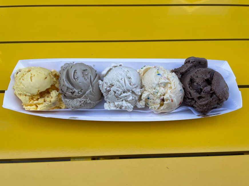 Rectangular dish with flight of five small scoops of ice cream