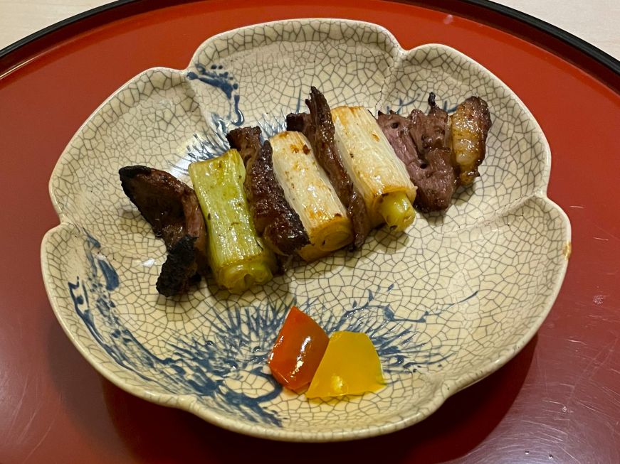 Grilled duck breast, Kaiseki Furukawa, Minneapolis Small pieces of duck breast and leeks on an antique porcelin plate