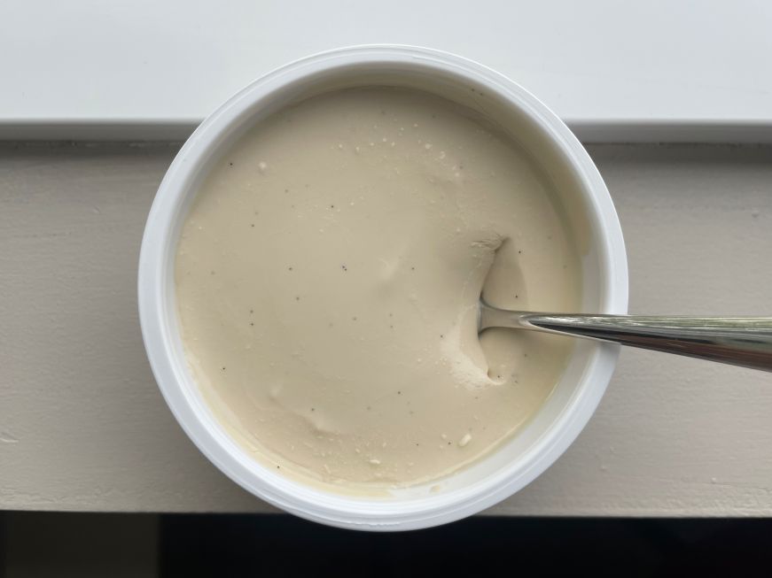 Top down view of individual cup of Kea Skyr Kaffi og Vanilla to show the thick texture