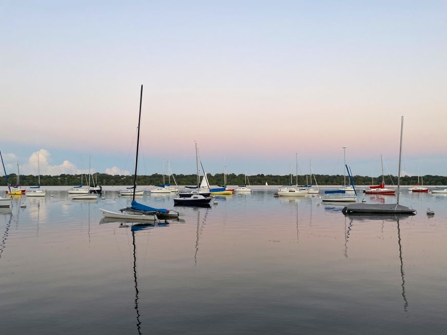 Lake Harriet Sailboats on a still lake at dusk