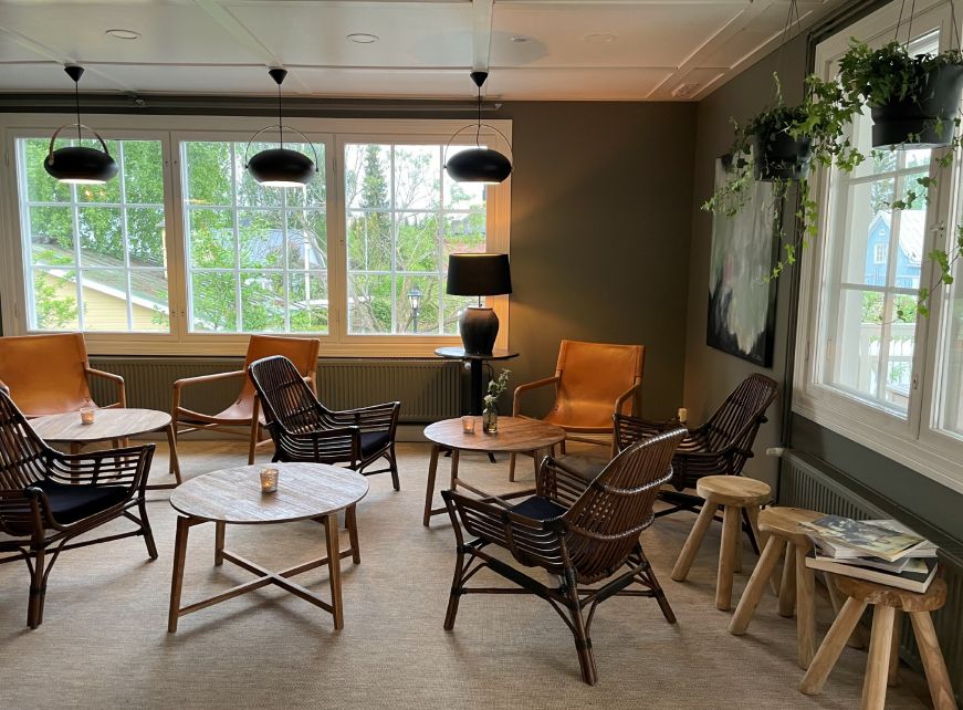 Lounge, Lillan Hotel Lounge area with several chairs and small tables