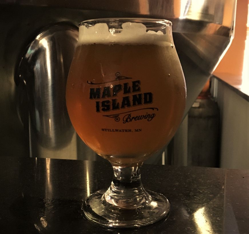 Beer at Maple Island Brewing Tulip glass of beer with Maple Island Brewing logo