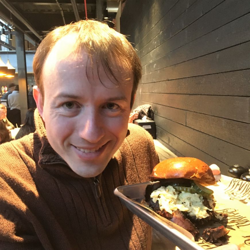 Mike with brisket sandwich, Revival Smoked Meats, Keg and Case