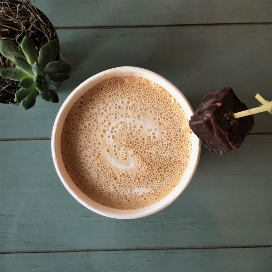 Mocha garnished with a chocolate truffle 