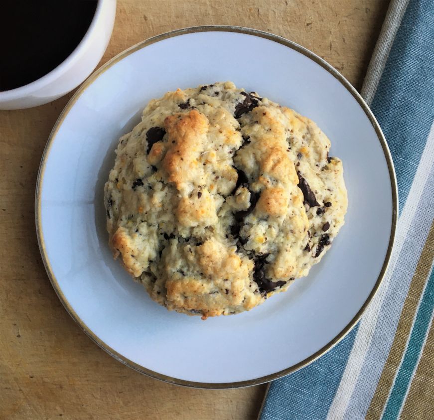 Orange chocolate scone, Nana's Bake Shoppe Orange chocolate scone on a small plate