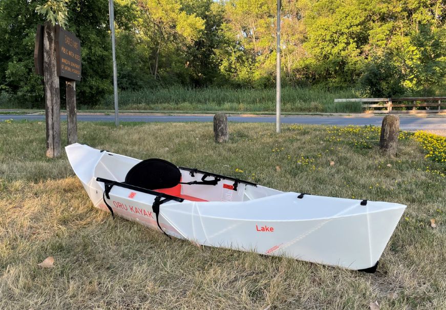 Oru Lake Kayak sitting on grass