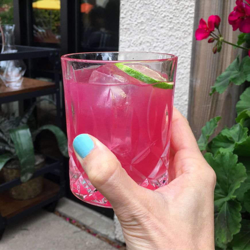 Hand holding a pink cocktail, Bardo, Minneapolis