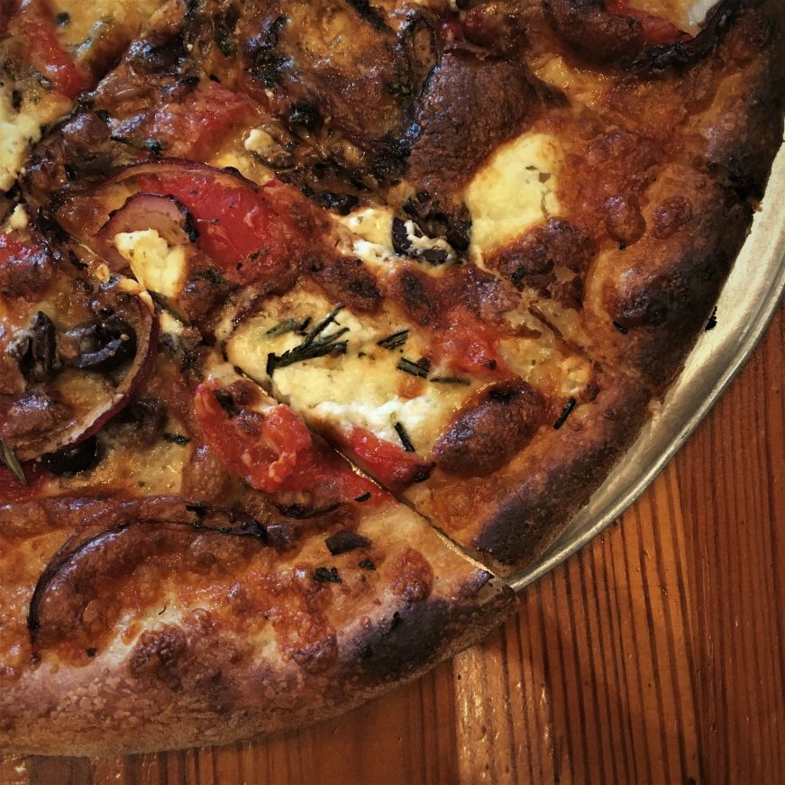Punctuated Equilibrium, Flatbread Co., Paia, Maui Pizza topped with olives and tomatoes, Flatbread Co., Paia, Maui
