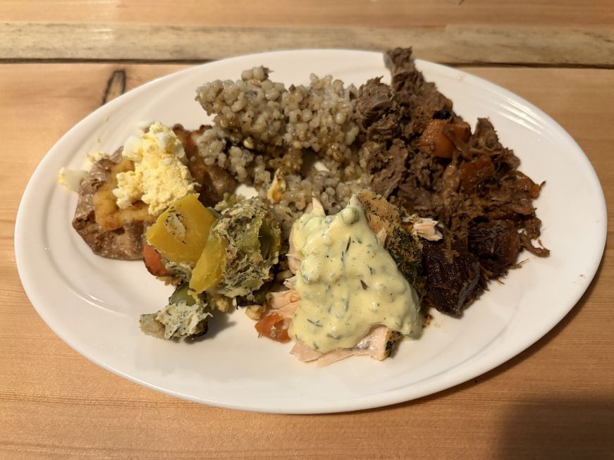 Plate of food including sauteed reindeer
